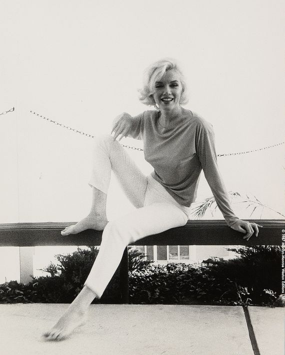 George Barris - 3 Bll.: Marilyn with seaweed draped over shoulder. Marilyn in a knitted jacket, lying on sand. Marilyn sitting on a bench